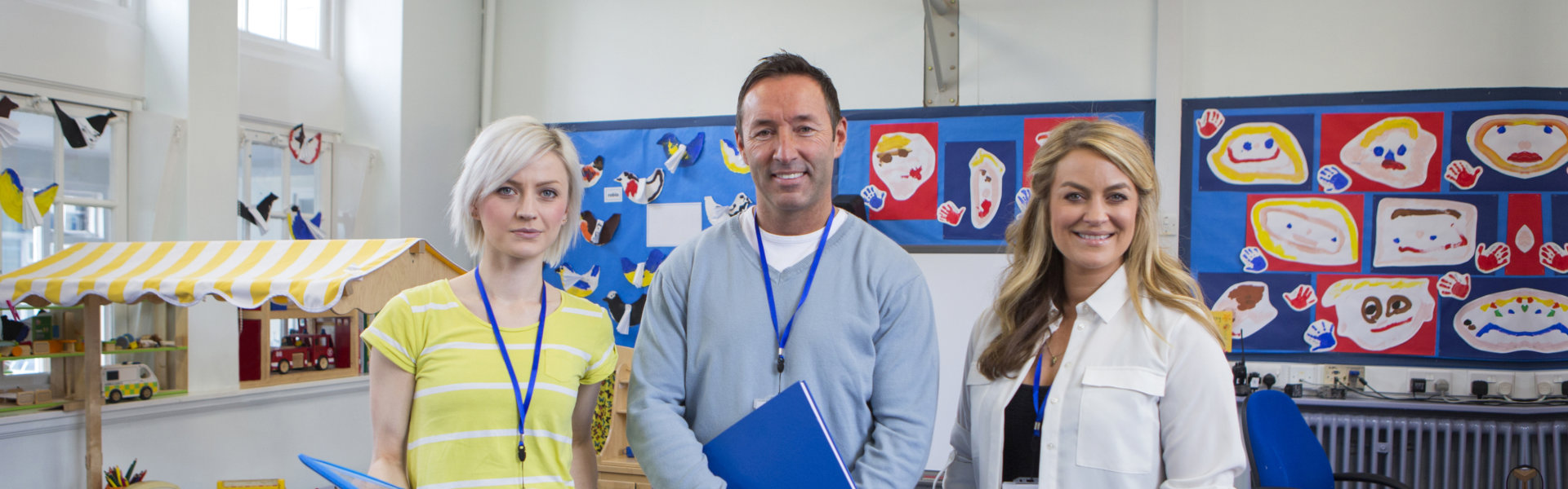 Three person smiling together